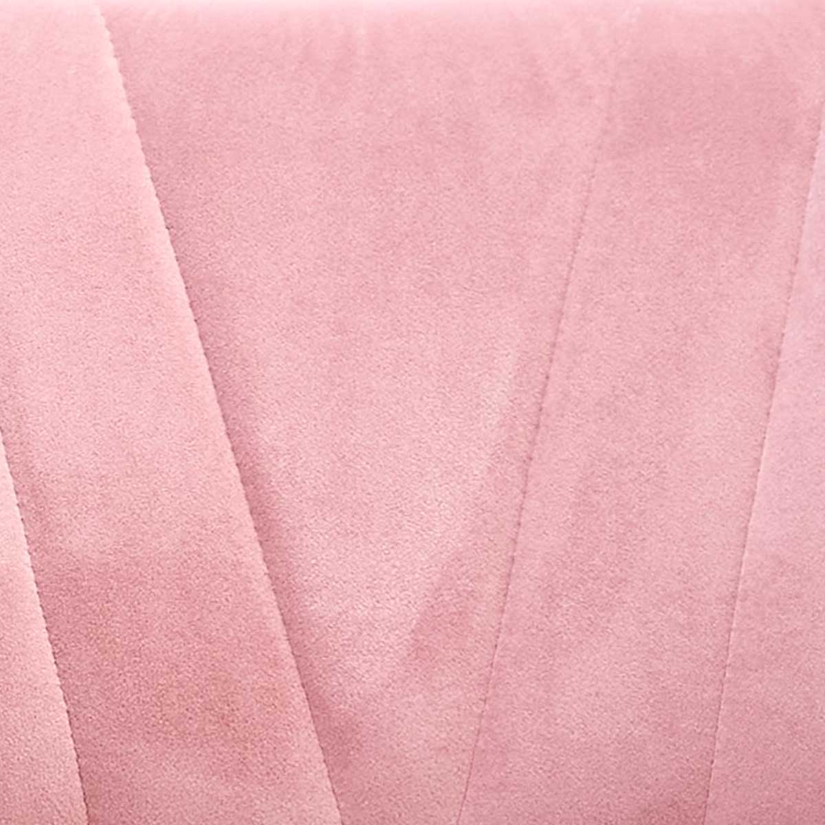 Butaca tapizada en tela rosa, modelo TOUS.